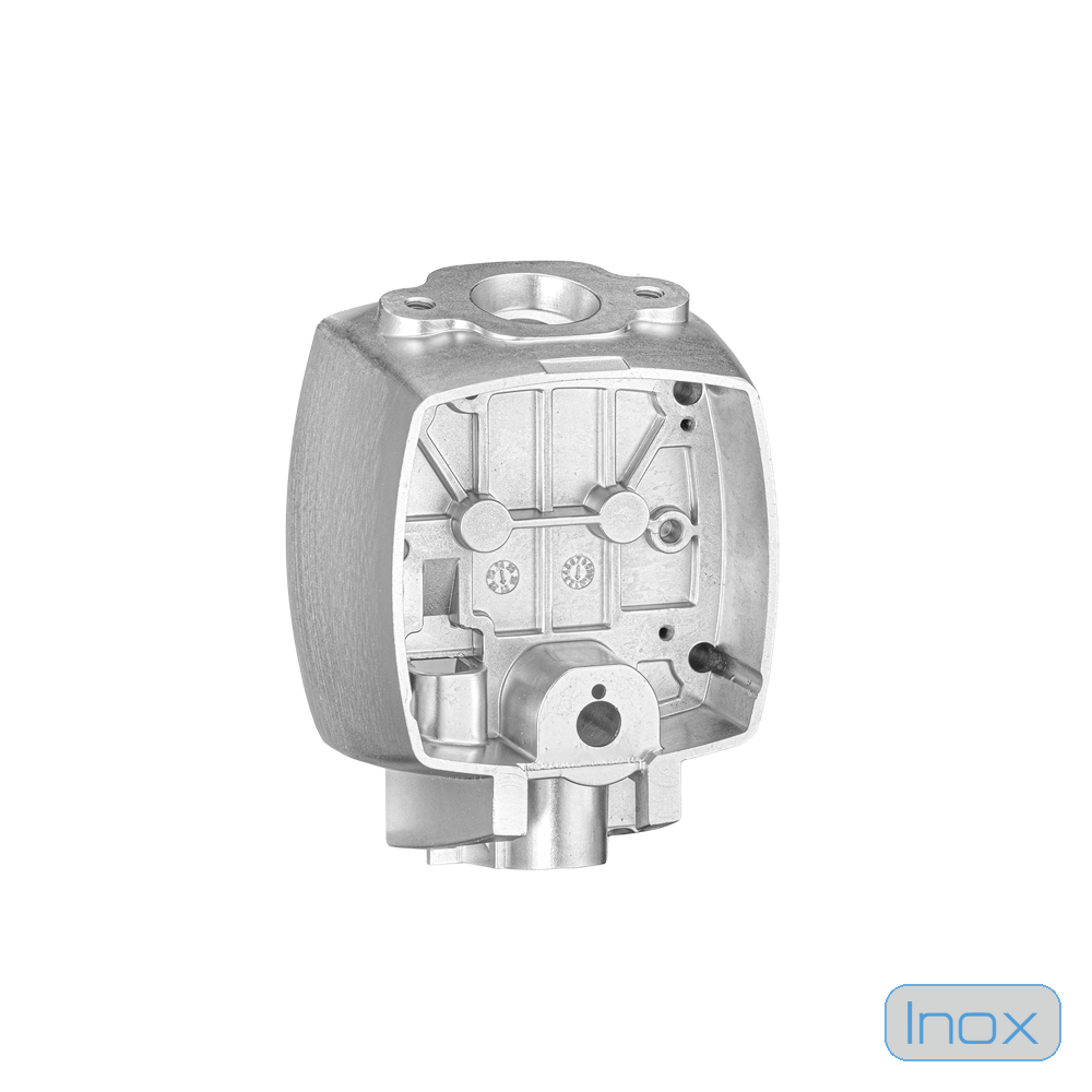 An aluminium die-cast housing showing as-cast ribs, bosses and a machined bore face